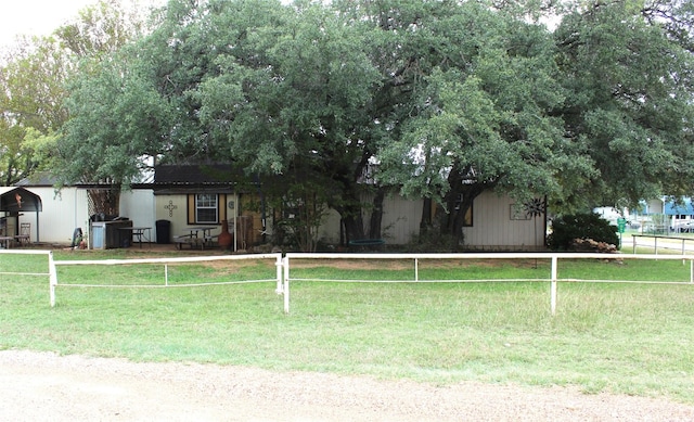 view of front facade with a front lawn