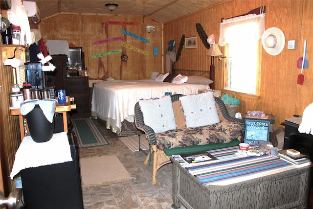 bedroom with wooden walls