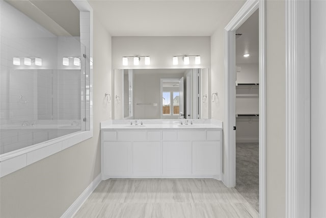 bathroom featuring double vanity and tile patterned floors