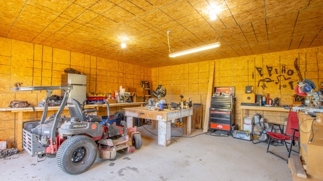 garage featuring a workshop area