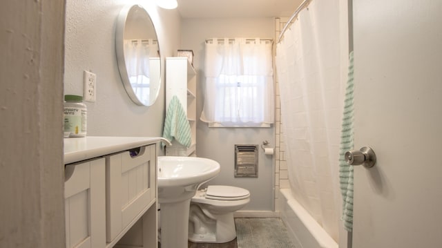 bathroom with toilet and shower / tub combo with curtain