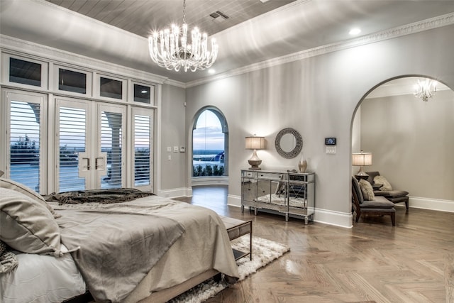 bedroom with a notable chandelier, parquet flooring, ornamental molding, and french doors