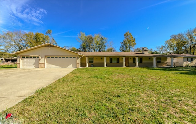 single story home featuring a front lawn and a garage