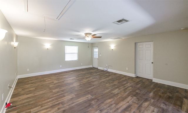 unfurnished room featuring ceiling fan and dark hardwood / wood-style floors