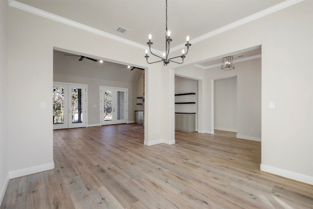 unfurnished living room with ornamental molding, light hardwood / wood-style floors, french doors, and ceiling fan with notable chandelier