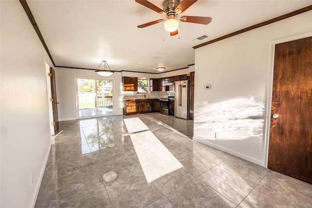 unfurnished living room with ceiling fan, ornamental molding, light tile flooring, and sink