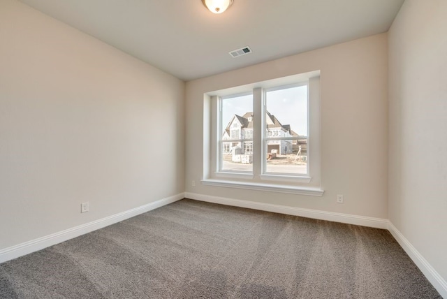 view of carpeted spare room