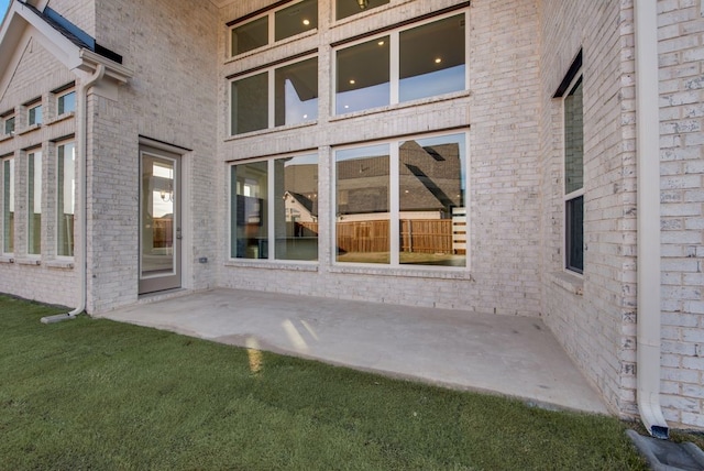 doorway to property featuring a patio