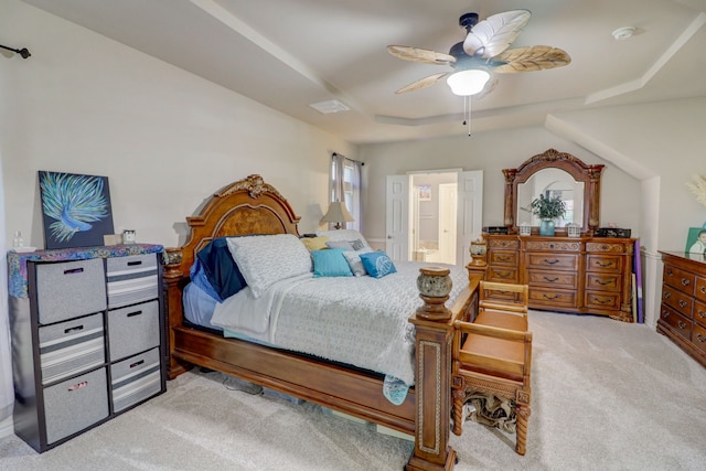 bedroom featuring light colored carpet and ceiling fan