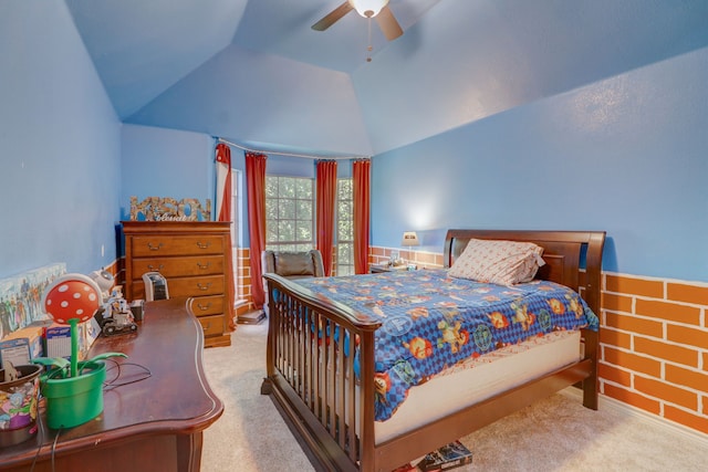 carpeted bedroom with ceiling fan and lofted ceiling