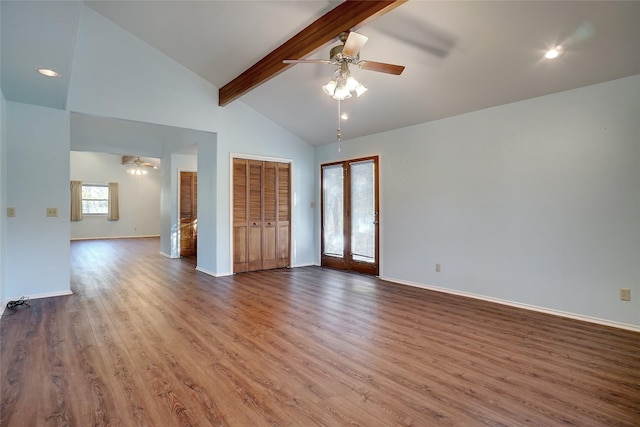 unfurnished room featuring french doors, ceiling fan, beam ceiling, wood-type flooring, and high vaulted ceiling