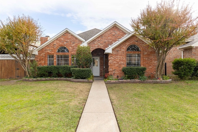 view of front of property with a front lawn