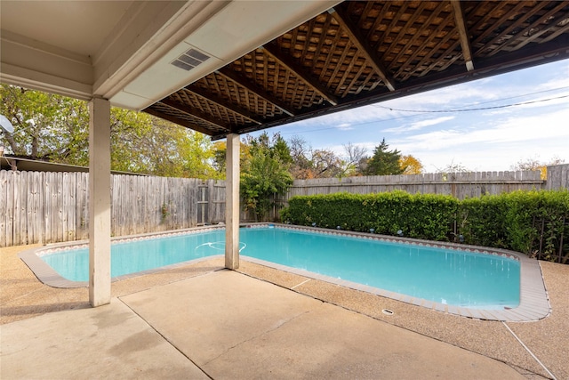 view of pool featuring a patio area