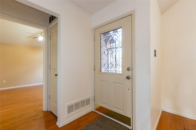 entryway featuring hardwood / wood-style floors and ceiling fan