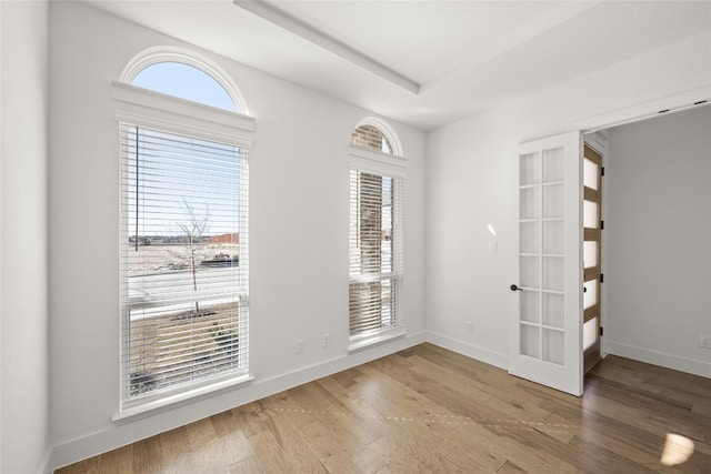 entryway featuring french doors and light hardwood / wood-style flooring