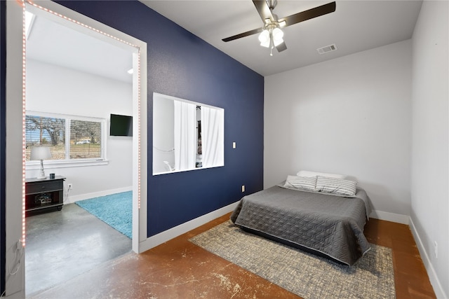 bedroom featuring concrete floors and ceiling fan