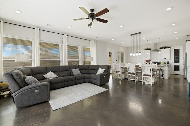 living room featuring ceiling fan