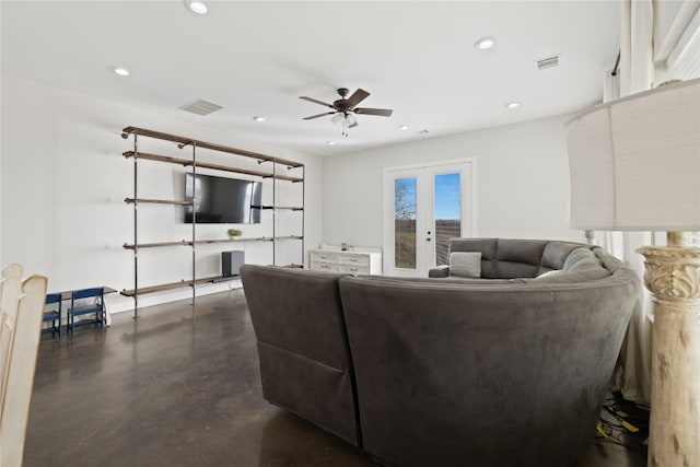 living room with ceiling fan and french doors