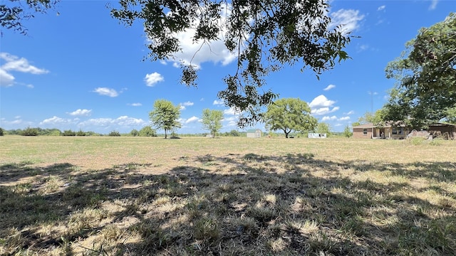 view of yard featuring a rural view