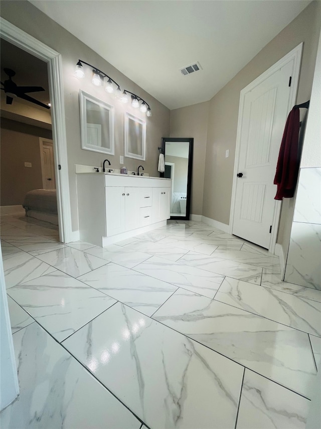 interior space with tile patterned floors and vanity