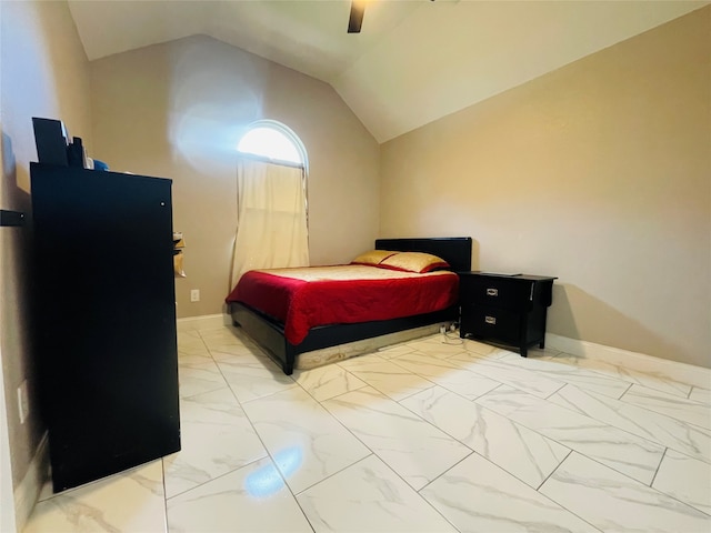 bedroom with light tile patterned floors, lofted ceiling, and ceiling fan