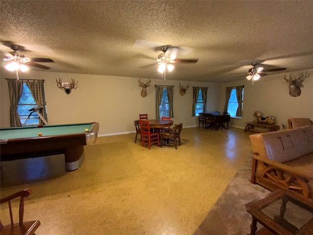 recreation room featuring a textured ceiling, billiards, and ceiling fan