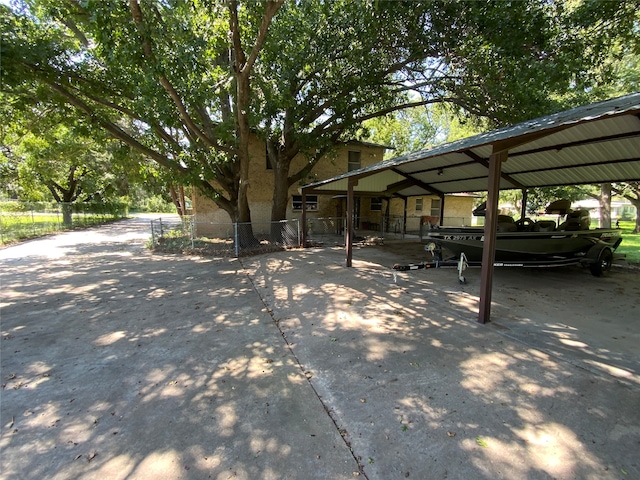 exterior space featuring a carport