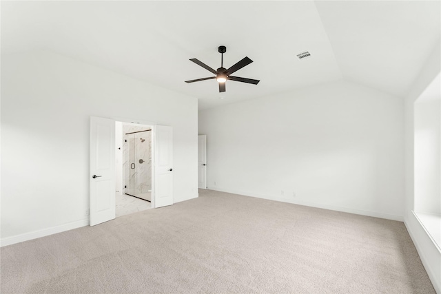 unfurnished room with light carpet, lofted ceiling, and ceiling fan