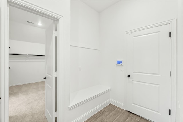 mudroom with light wood-type flooring