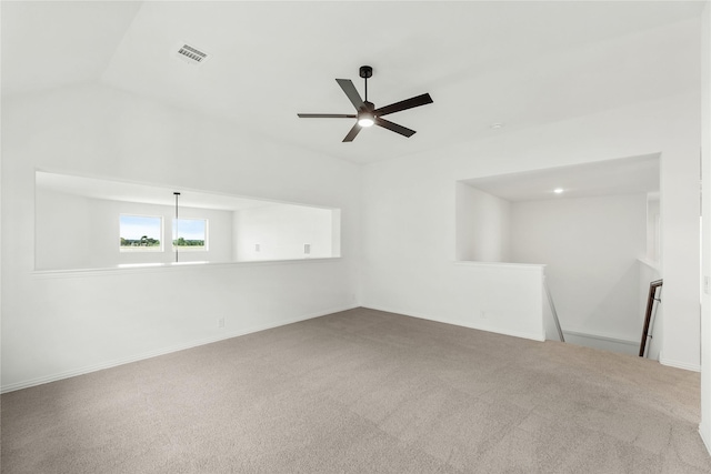 carpeted empty room with ceiling fan