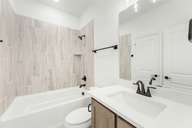 full bathroom featuring vanity, toilet, and tiled shower / bath combo