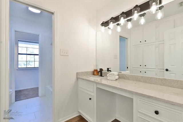 bathroom with vanity and shower / bathtub combination