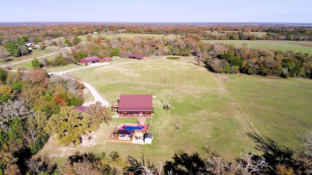 birds eye view of property with a rural view