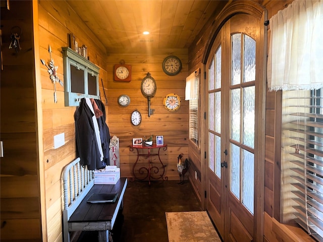 mudroom with recessed lighting, wooden ceiling, french doors, and wood walls