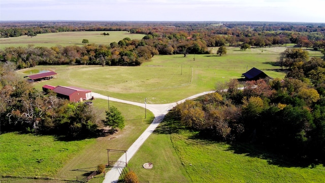 birds eye view of property featuring a rural view