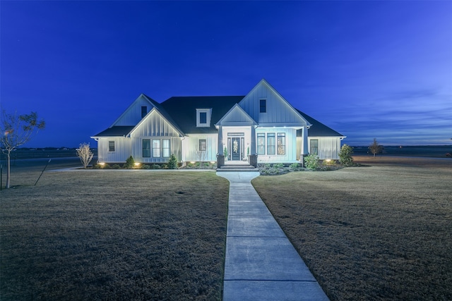 view of front of home featuring a front lawn