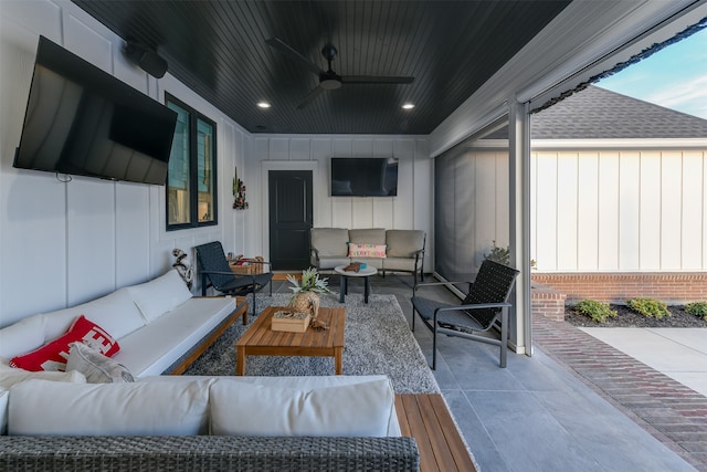 view of patio featuring an outdoor hangout area and ceiling fan