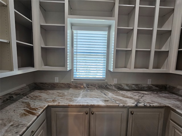 kitchen with light stone counters