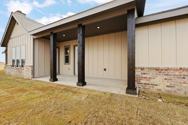 exterior space with a yard and a patio