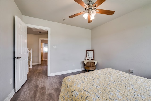 bedroom featuring dark hardwood / wood-style floors and ceiling fan