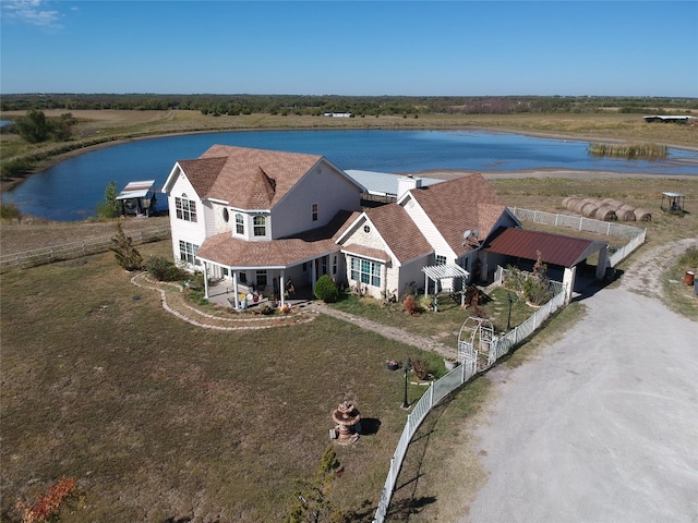 bird's eye view with a water view