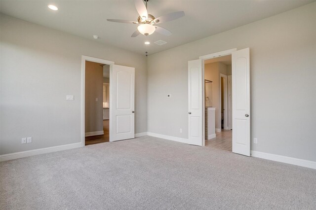 5621 Rutherford Dr, Midlothian, TX 76065 - unfurnished bedroom featuring baseboards, carpet, and visible vents
