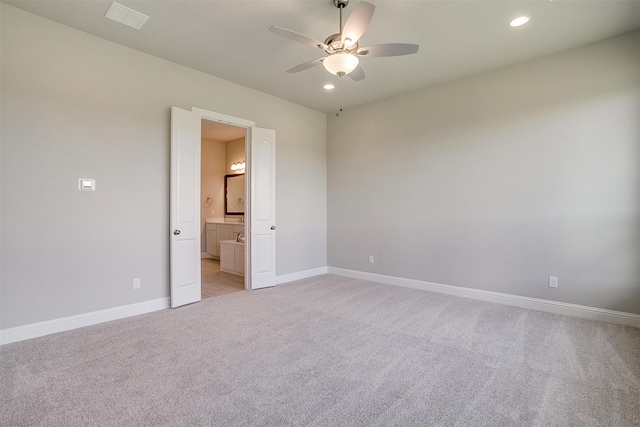 interior space with ceiling fan