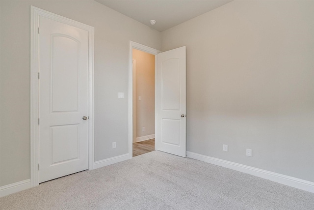 5621 Rutherford Dr, Midlothian, TX 76065 - unfurnished bedroom featuring baseboards and carpet