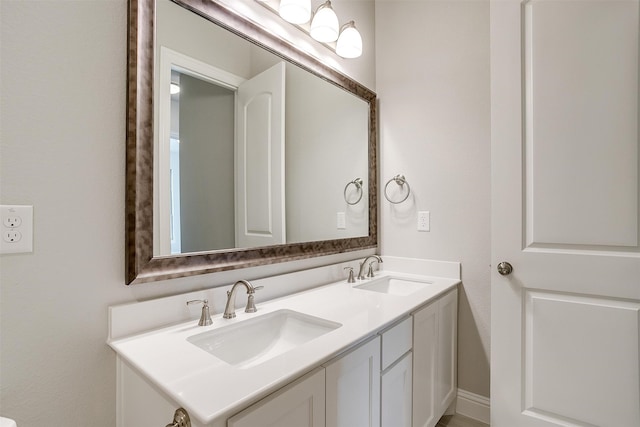 bathroom with double vanity