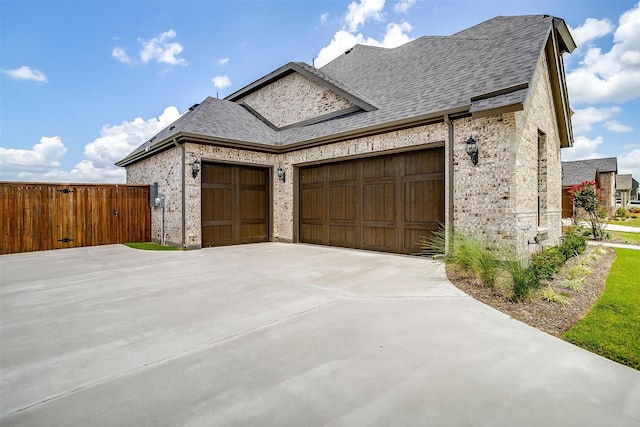 view of home's exterior with a garage