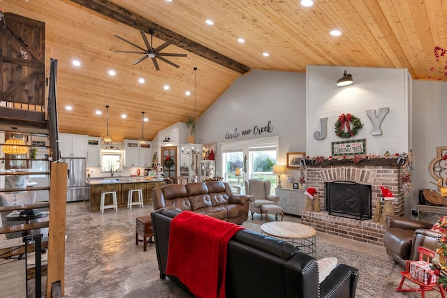 living room featuring a brick fireplace, beamed ceiling, ceiling fan, wooden ceiling, and high vaulted ceiling