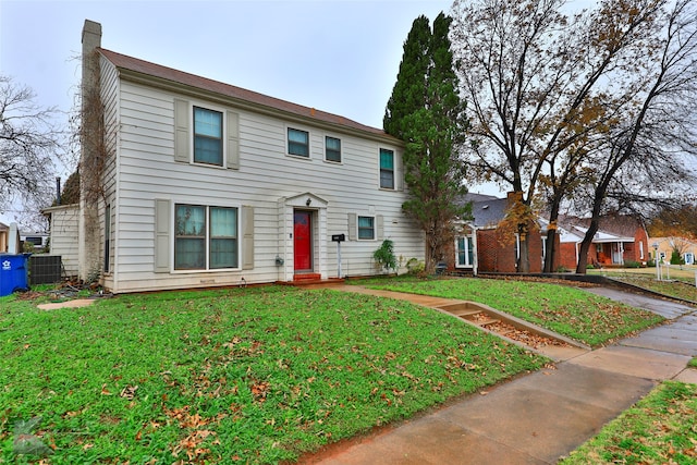 view of front of home featuring a front yard