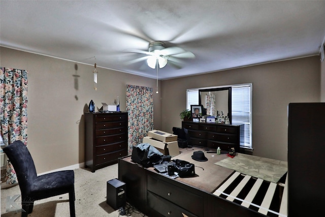 bedroom featuring a ceiling fan and baseboards