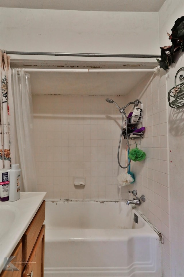 full bathroom with vanity and shower / tub combo with curtain